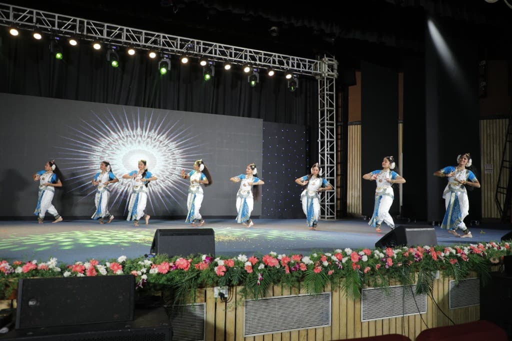 Students performing a classical dance at Lawrence High School