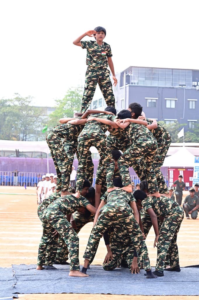 Cadets forming a human pyramid at Lawrence High School