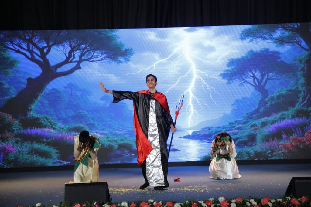 High school students performing a drama on stage at Lawrence High School