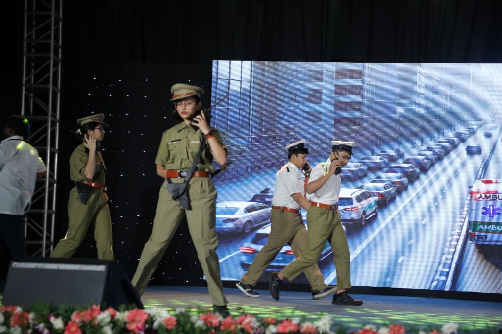 High school students performing a civic-themed play at Lawrence High School