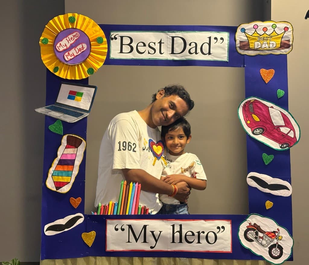 A father and child celebrating Best Dad day at Lawrence High School