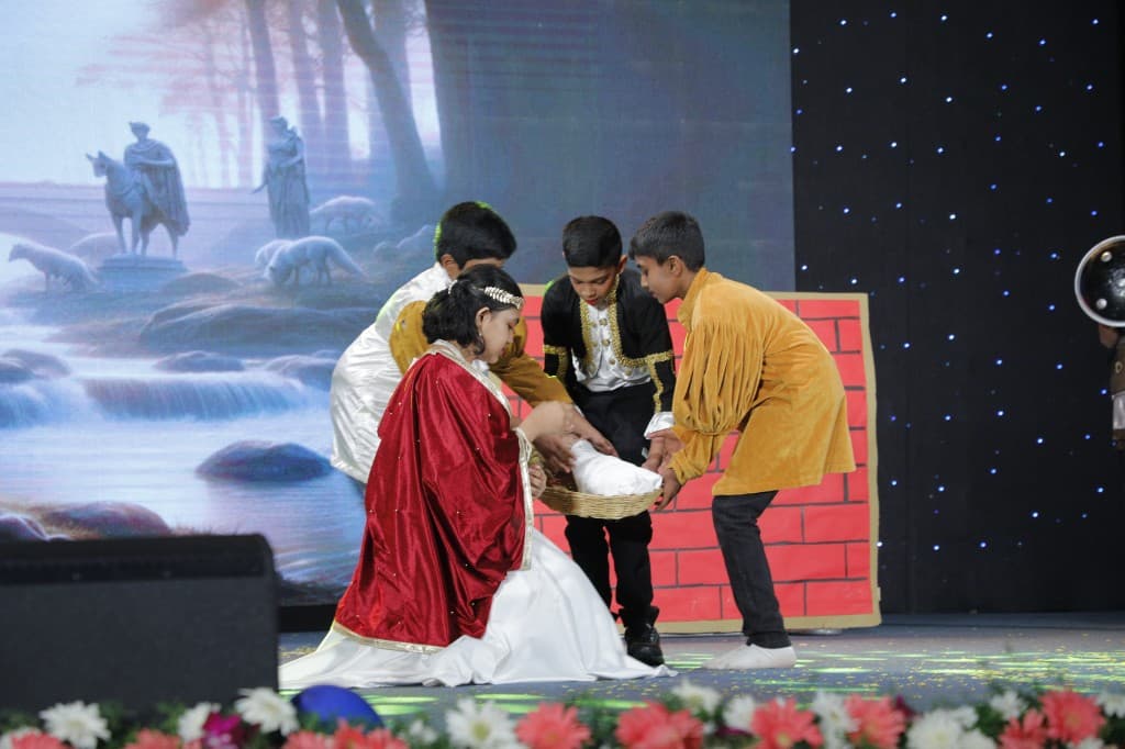 Middle school students performing a historical play at Lawrence High School