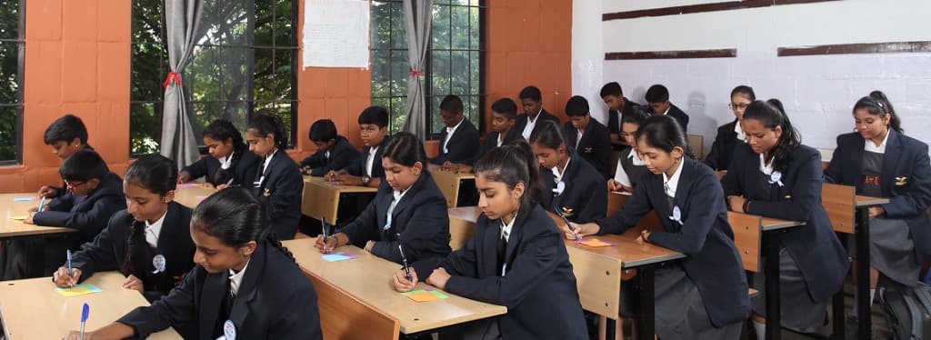 High school students working together in class
