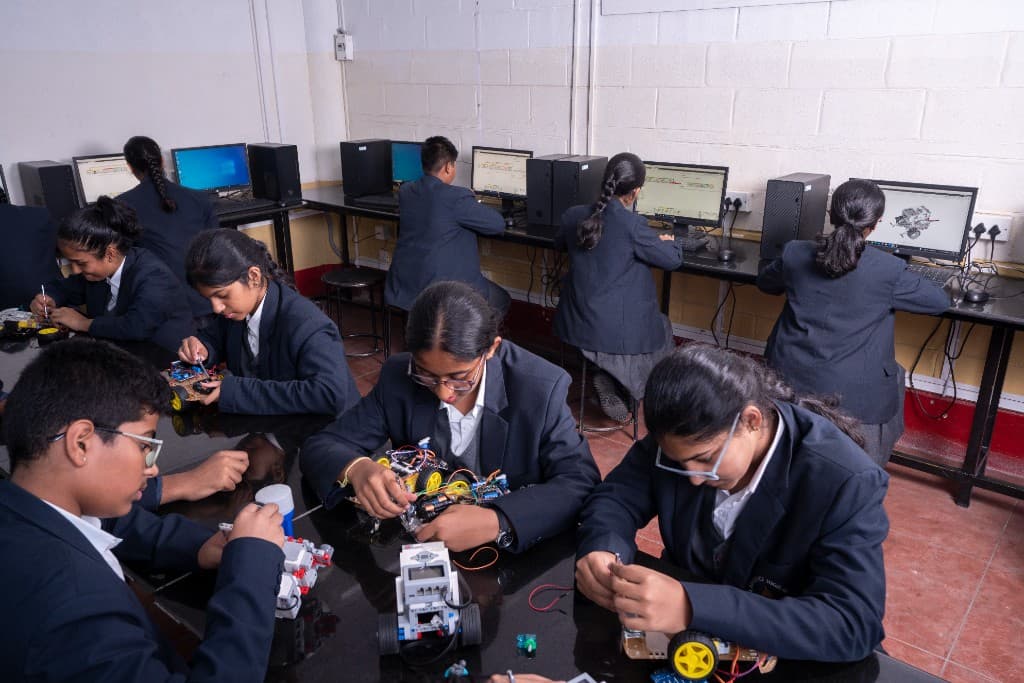 Students building robots at Lawrence High School