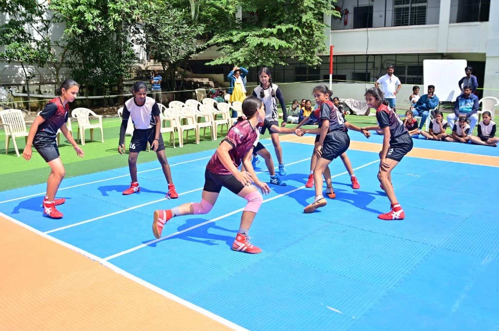 Students playing kabaddi at Lawrence High School