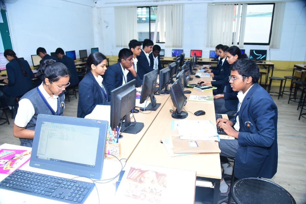 Students working at computers in the Lawrence High School computer lab
