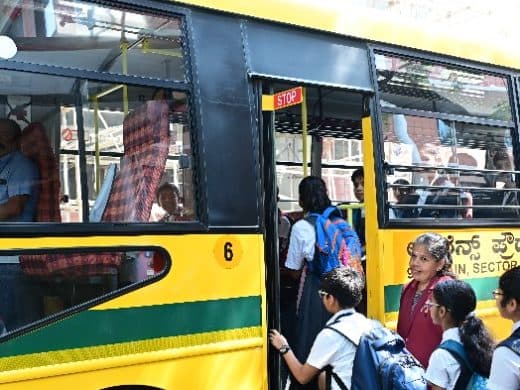 Students boarding a Lawrence High School bus